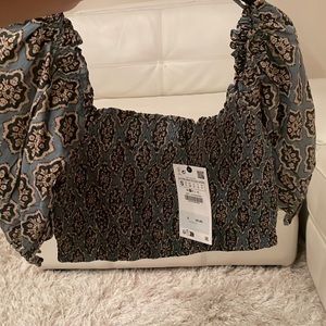 Small Zara blouse, brand new with tags.